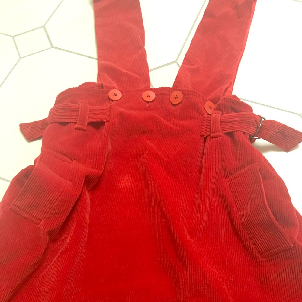 Brilliant red skirt with strap in Corduroy